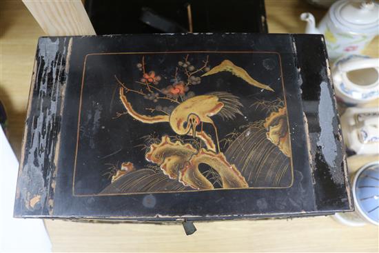 A Japanese lacquer cabinet on stand